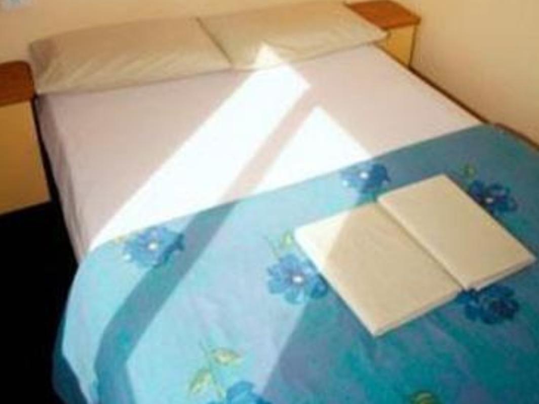 Hostel YHA Wellington Exterior foto A bed with a duvet